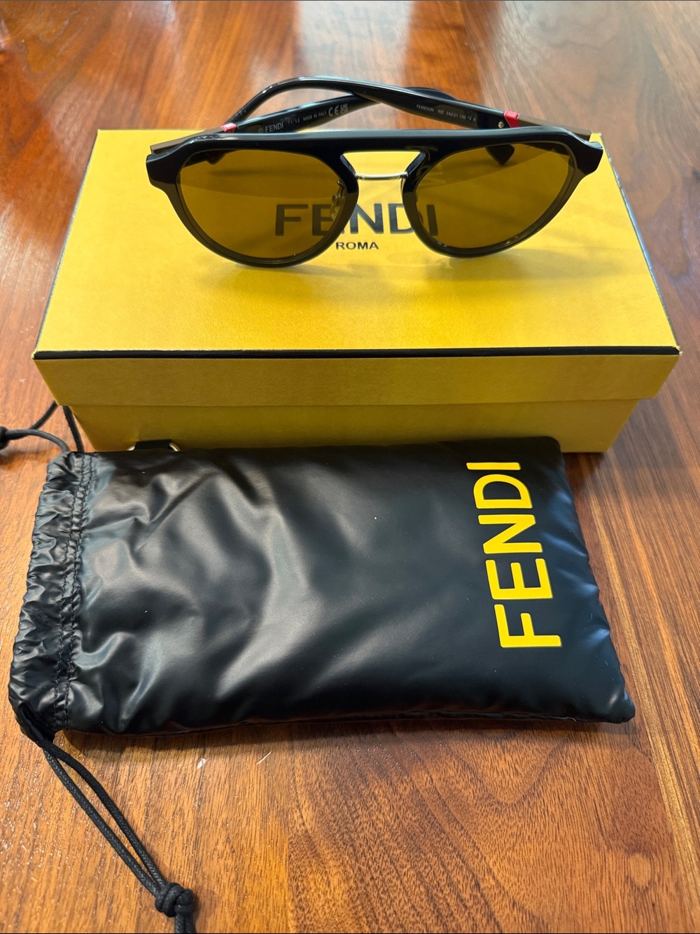 Fendi Black Frame Sunglasses with Amber Lenses